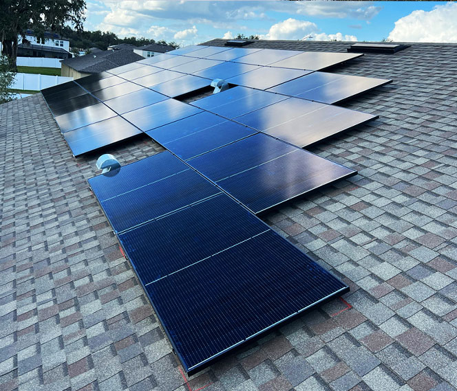 Rooftop solar panel installation by Home & Energy Solutions of Florida for residential energy efficiency.