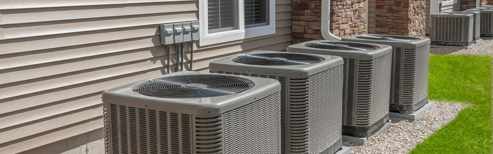 Row of high-efficiency HVAC units outside a Florida home providing energy-efficient cooling and comfort.